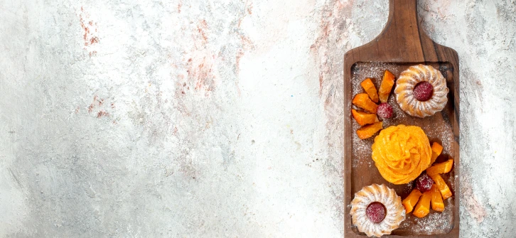 top view of a gourmet fall desert spread on a charcuterie board